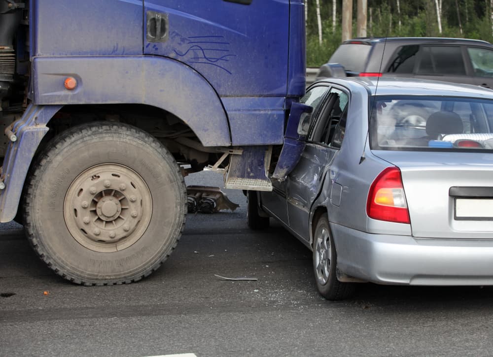 Truck broadside collision with a car