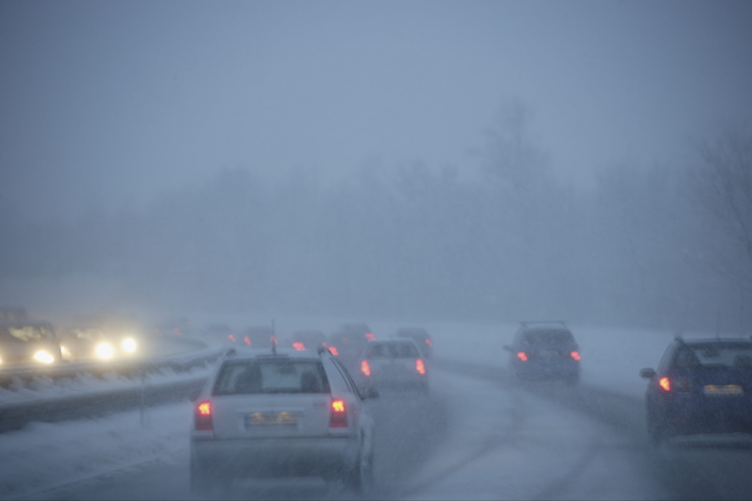 Cars on a wet road during cold weather conditions